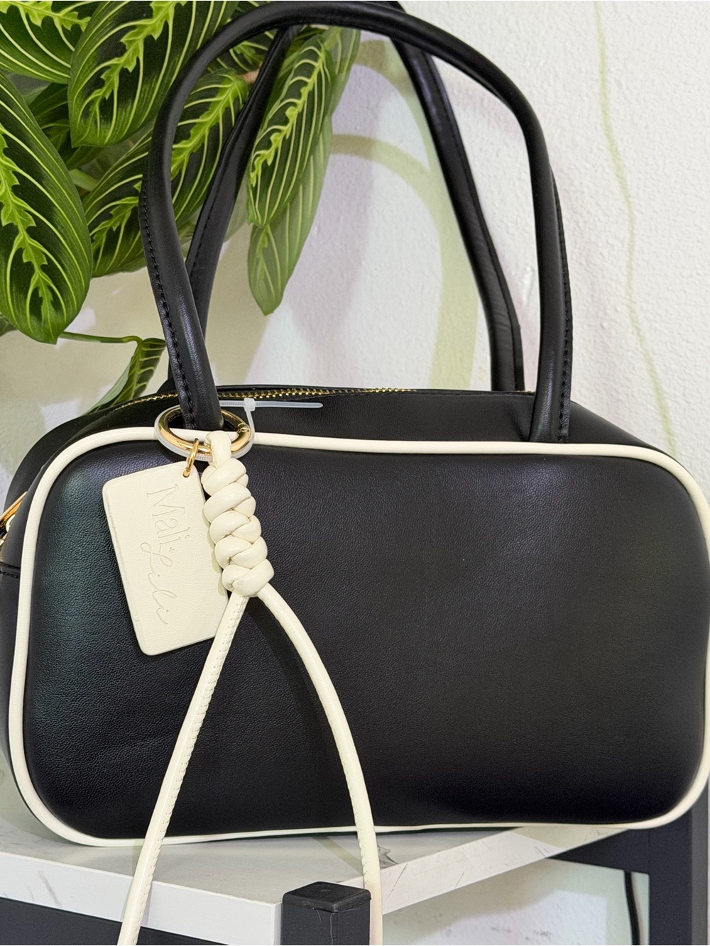 Madeline Black Shoulder Bag with Cream Trim and Braided Tag